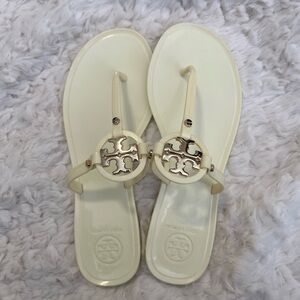 Tory Burch Cream/ Ivory Jelly Sandals with Gold Accents